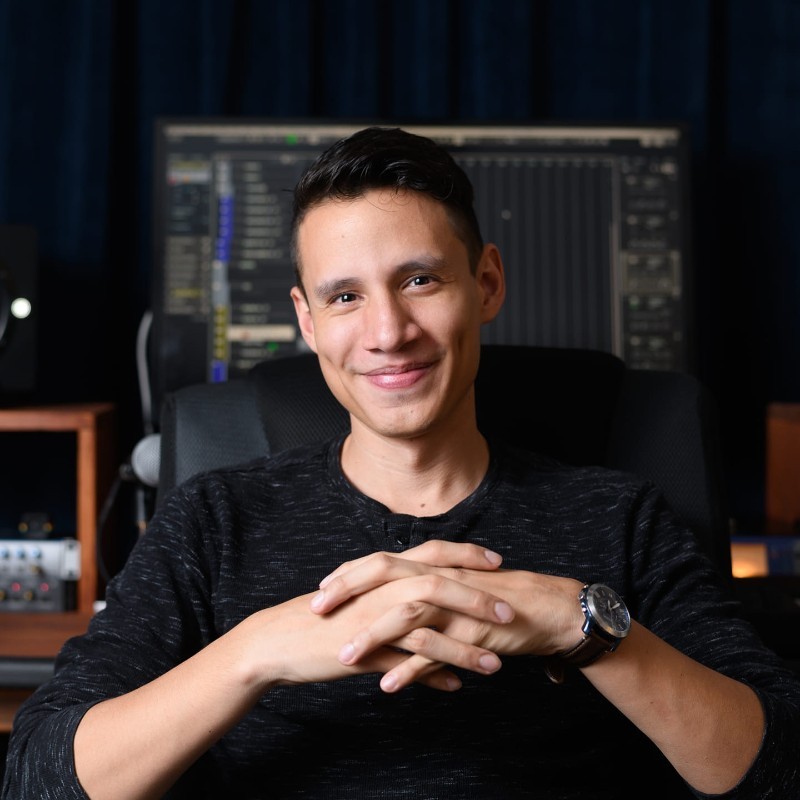 Headshot of Jhosua Rodriguez in front of his studio computer.